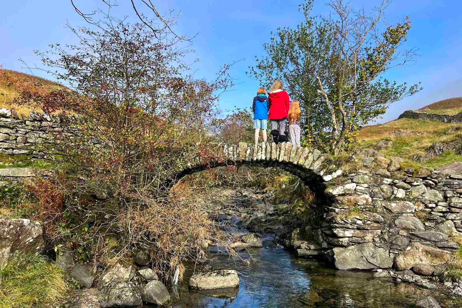 Michelle and two children stand on High Sweden Bridge.